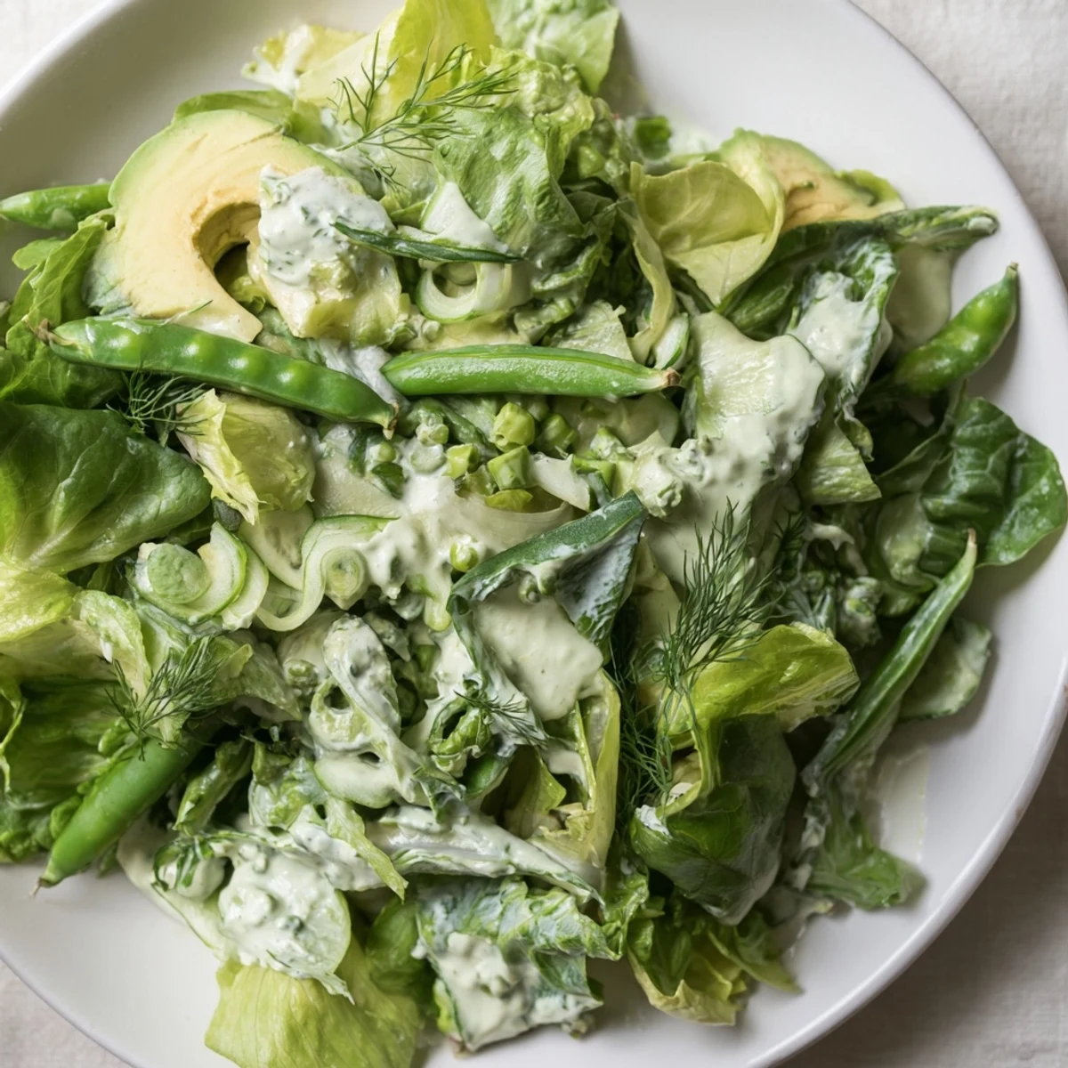 Bright herbs and a tangy lemon dressing make this Green Salad with Green Goddess Dressing perfect for a light meal.