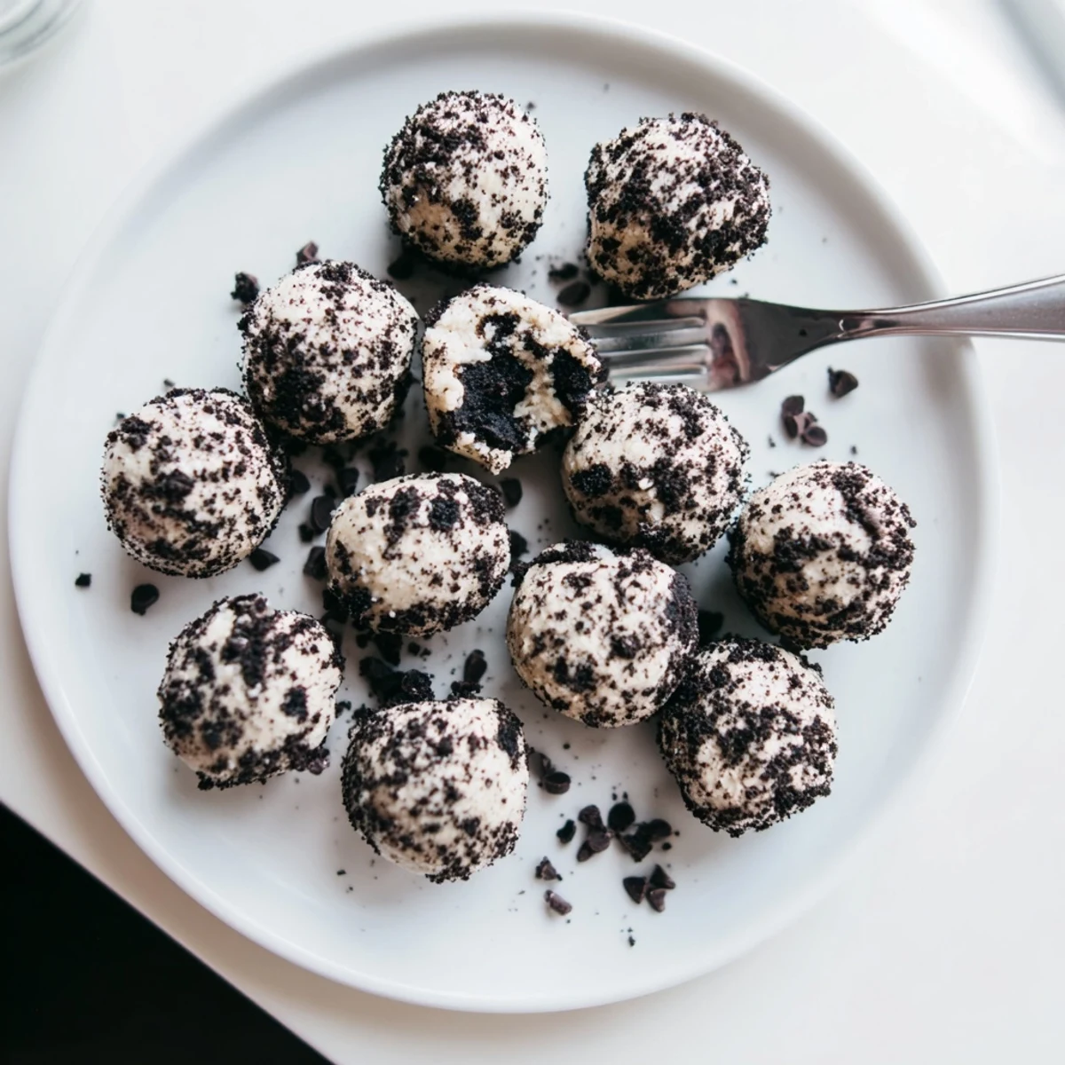 Smooth cream cheese and chocolate sandwich cookie centers, dusted with crumbs for a rich, satisfying sweet protein treat.