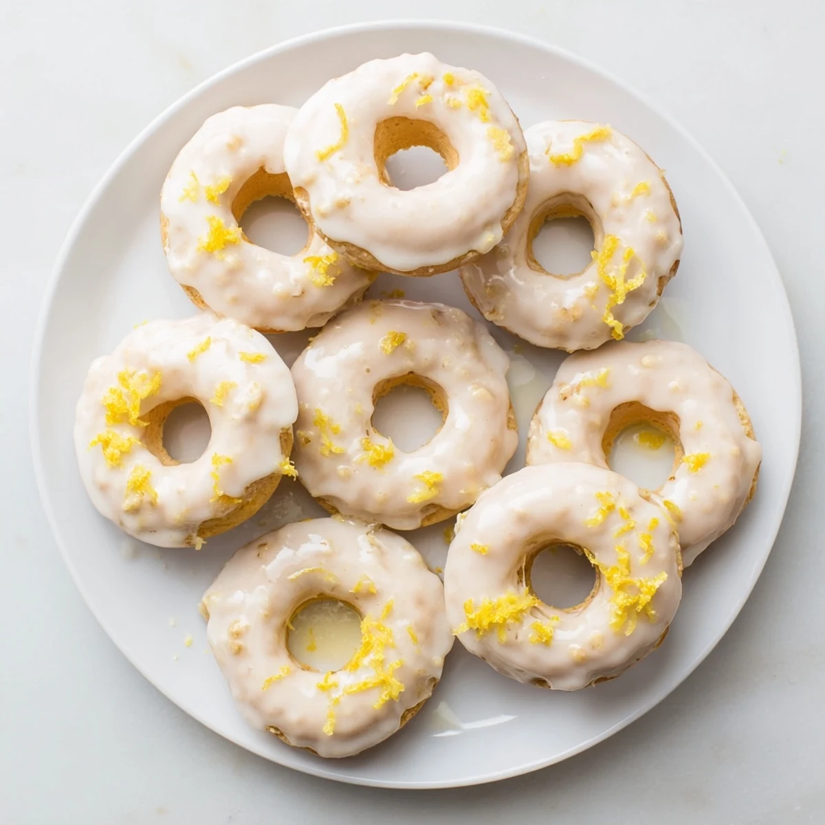 Glazed lemon mochi donuts with sweet tangy icing and chewy rice flour texture
