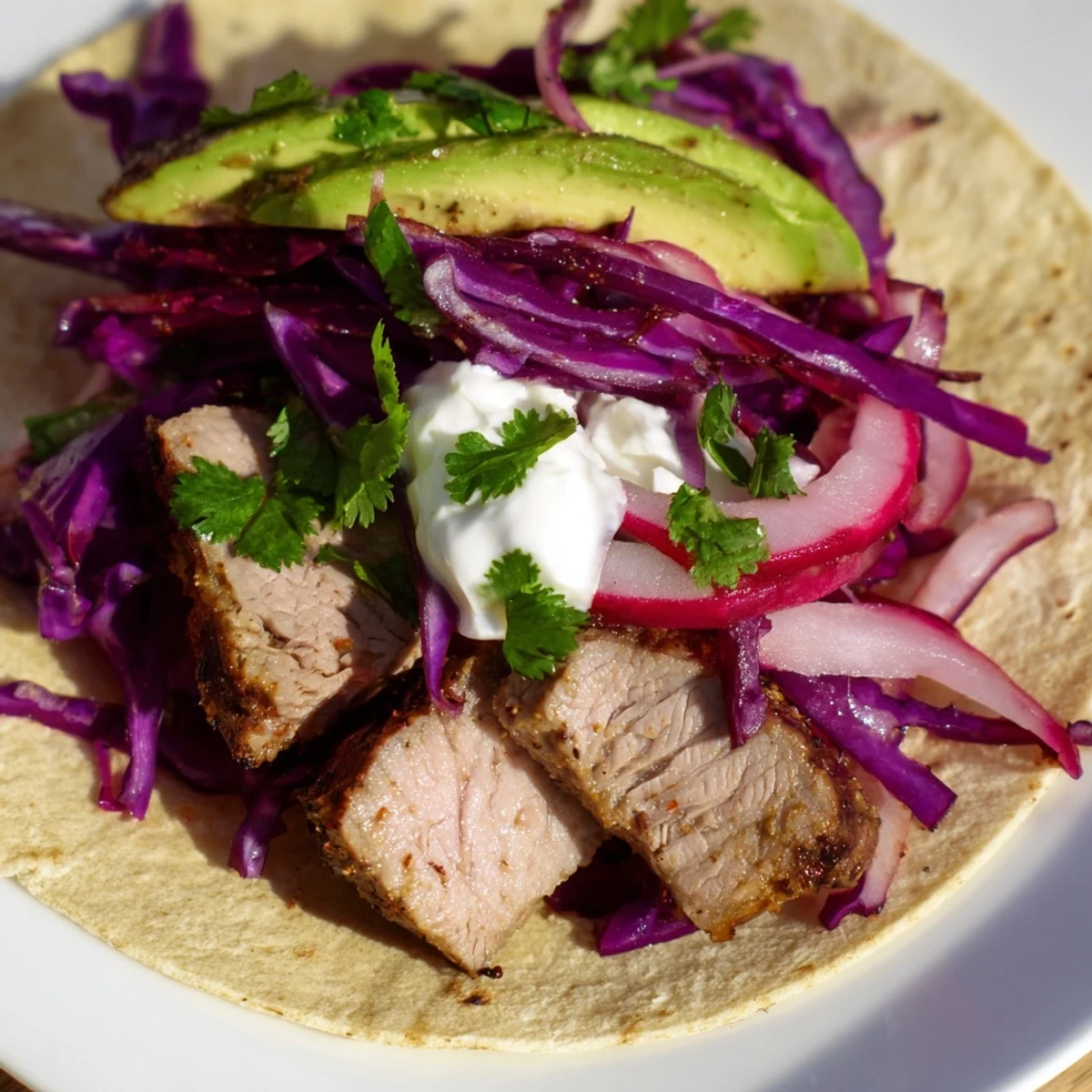 Golden roasted lamb with aromatic cumin spice crust served inside warm tortillas