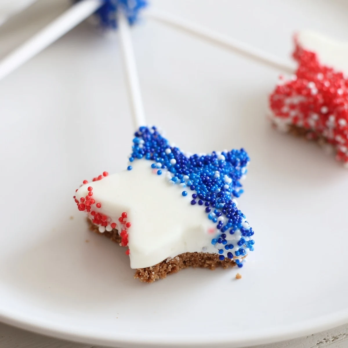 Fourth Of July Star Cheesecake Pops chilled, creamy centers on sticks, perfect picnic dessert