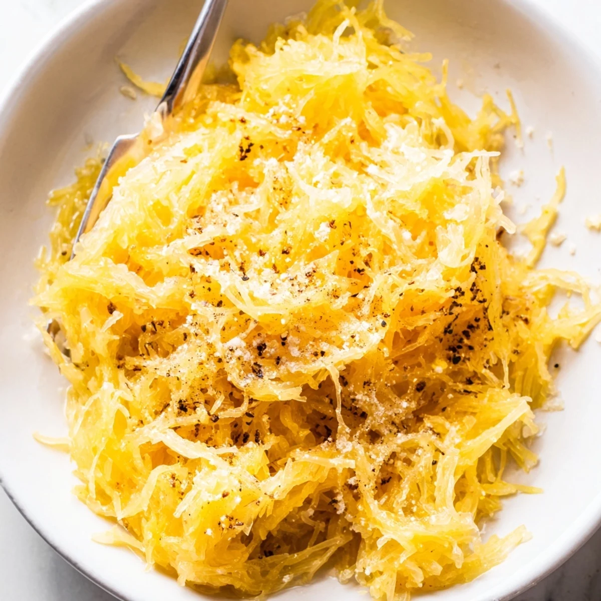 Spaghetti Squash Mac Cheese: creamy roasted squash strands topped with golden breadcrumbs.
